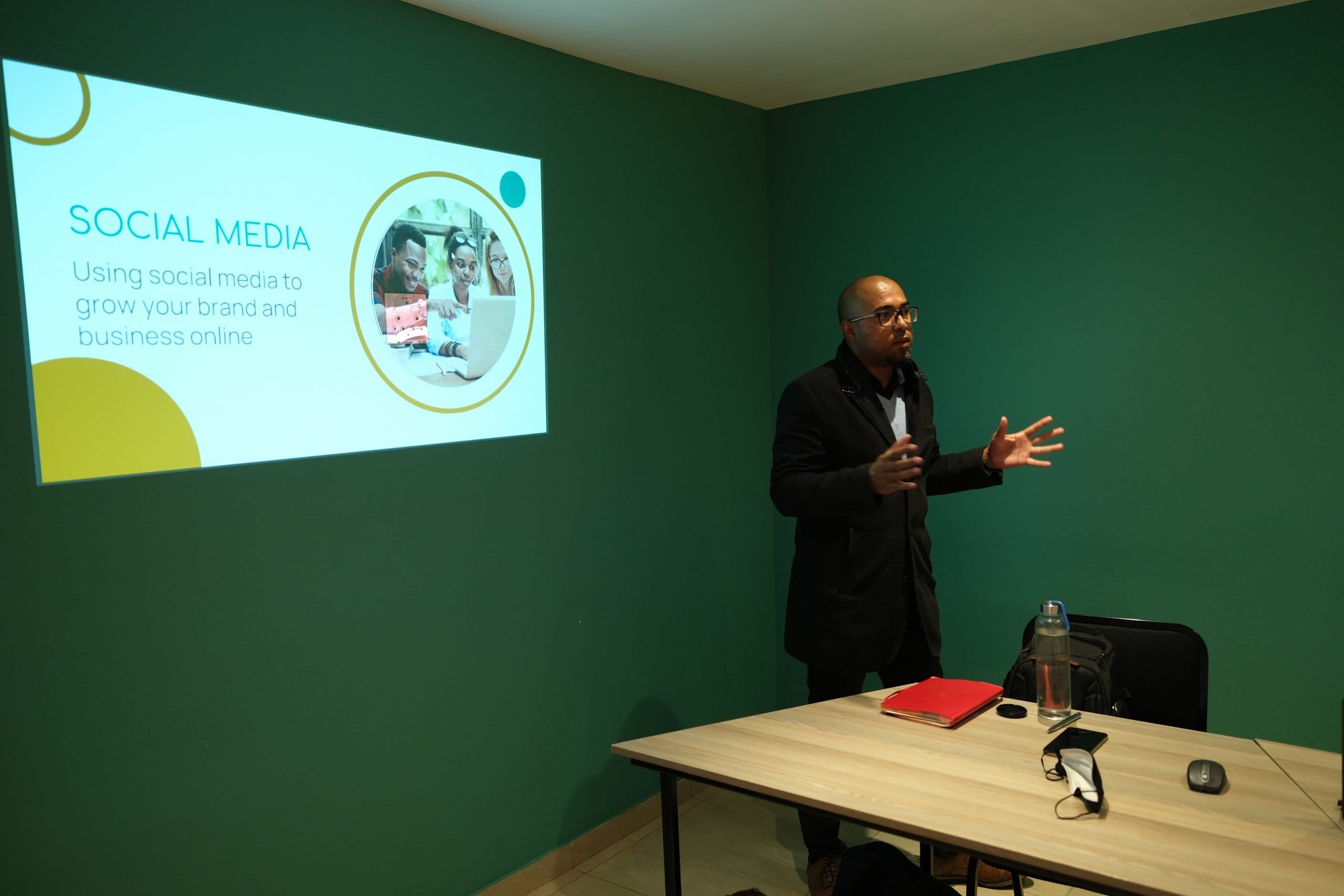 J29 facilitator presenting social media workshop to MSME owners